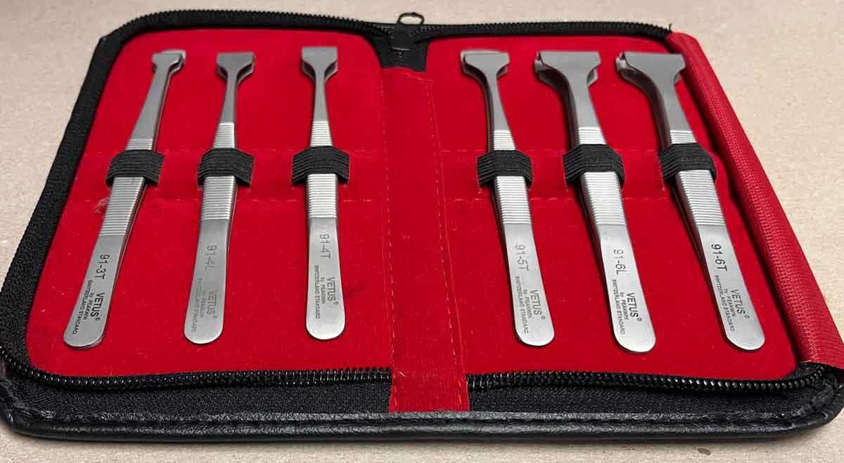 6 wafer handling tweezers set with black storage case, shows tweezers and models numbers
